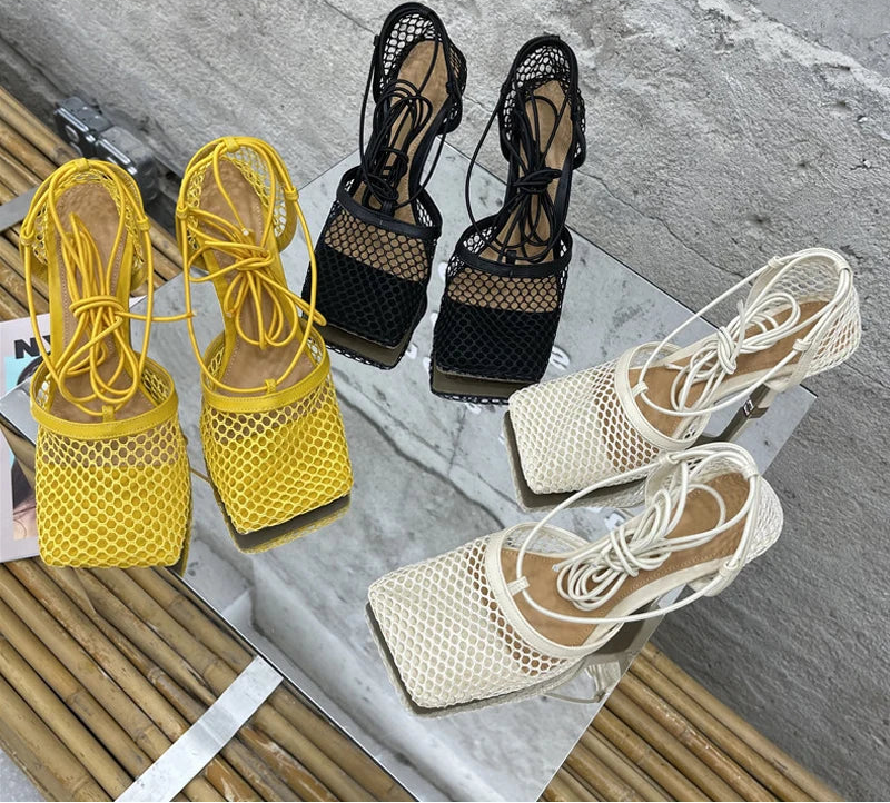 Yellow, black, and beige mesh sandals on a marble surface with 'Eilyken' branding.